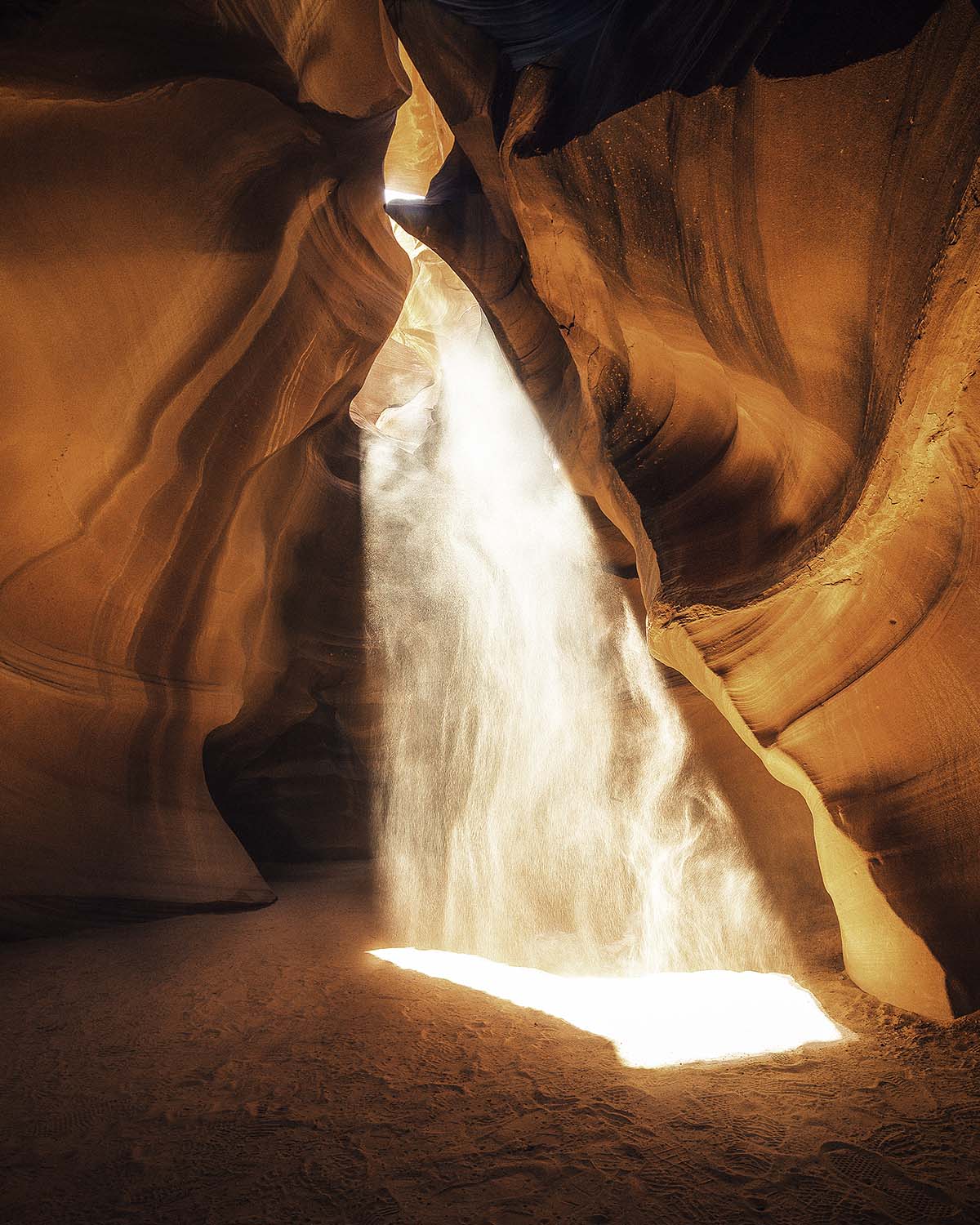 Light beam falling through Antelope Canyon slot canyon in Arizona