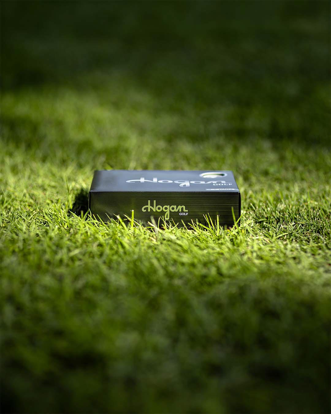 Ben Hogan Golf ball box packaging resting in the grass, by Niaz Uddin