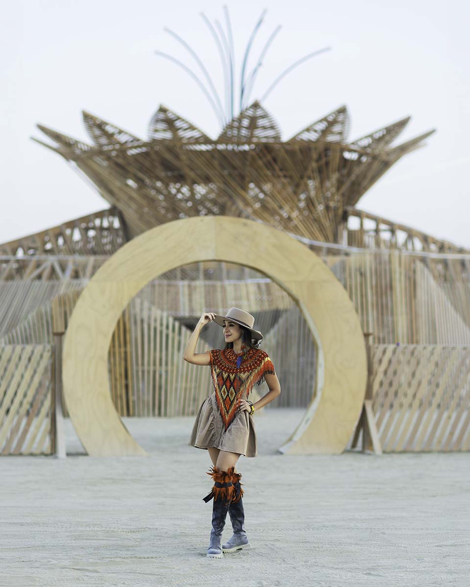 Elizabeth Ramirez standing in the circular entrance of the 2026 Burning Man temple, by Niaz Uddin