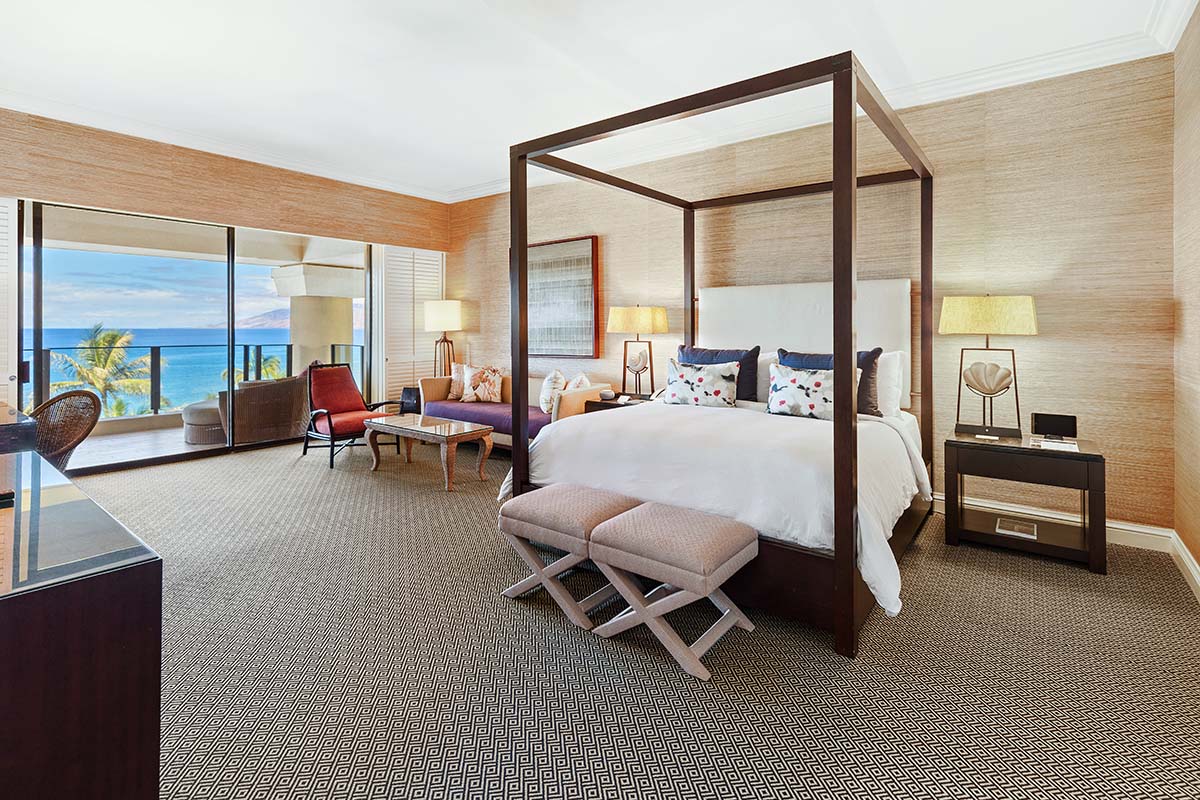 Ocean-view suite with a four-poster bed and a lanai overlooking the Pacific at Four Seasons Resort Maui, by Niaz Uddin