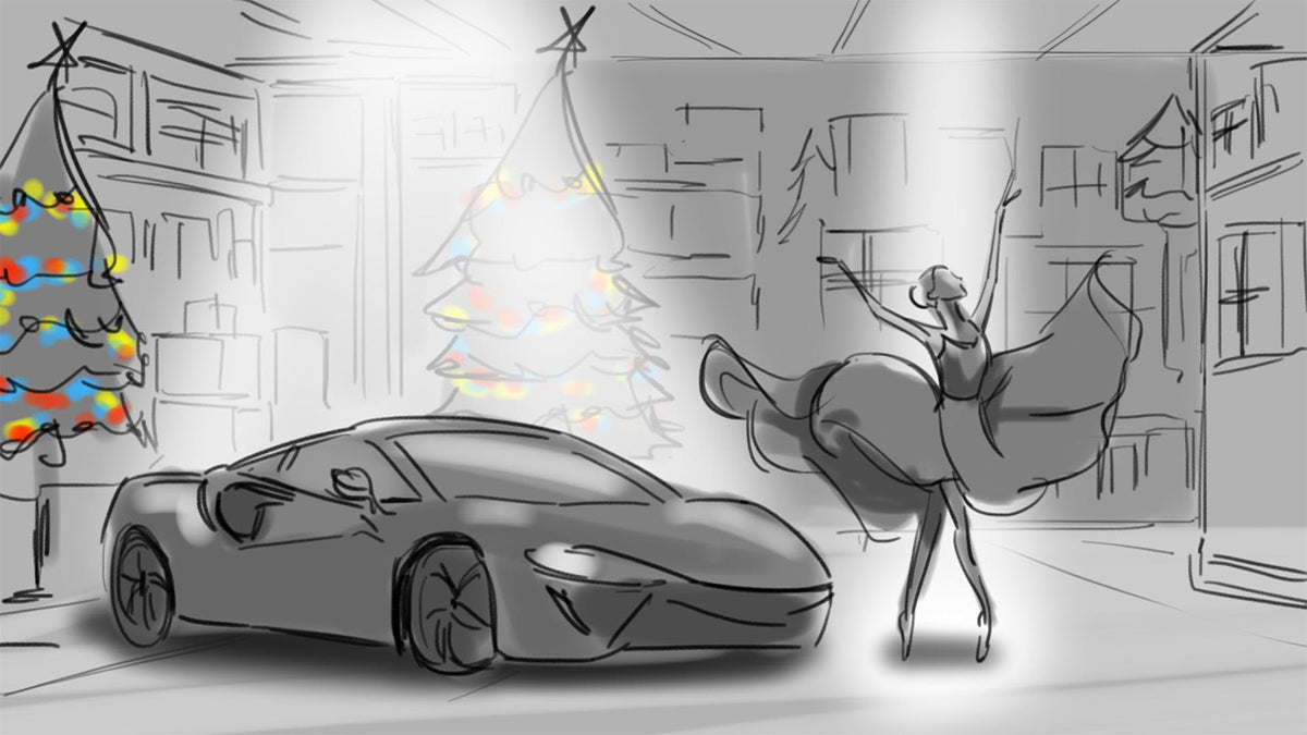 The approved storyboard: a ballerina beside a McLaren Artura Spider among lit Christmas trees