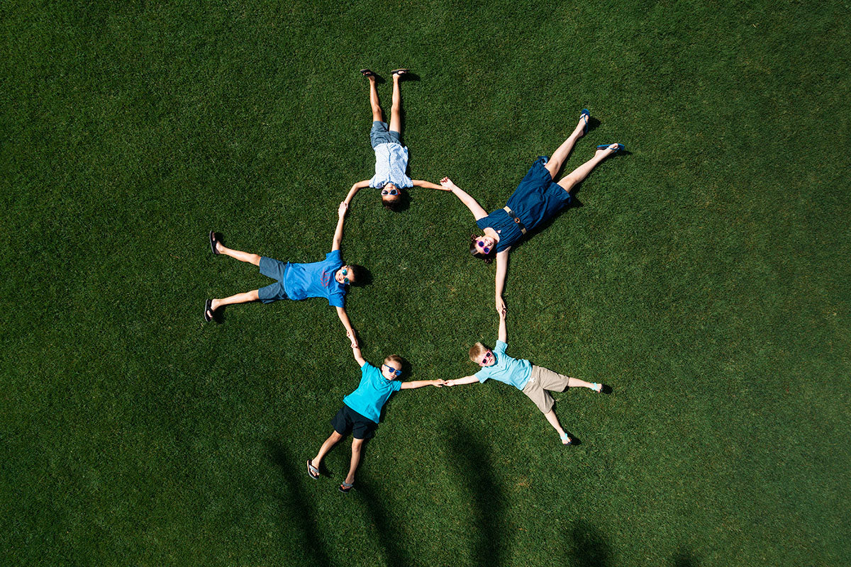 Aerial of children forming a star while playing on the lawn at Renaissance Esmeralda Resort & Spa in Indian Wells
