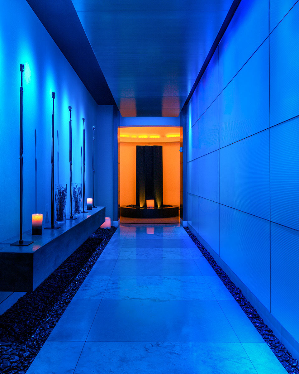 Candlelit spa relaxation hallway with blue and amber lighting at Renaissance Esmeralda Resort & Spa in Indian Wells