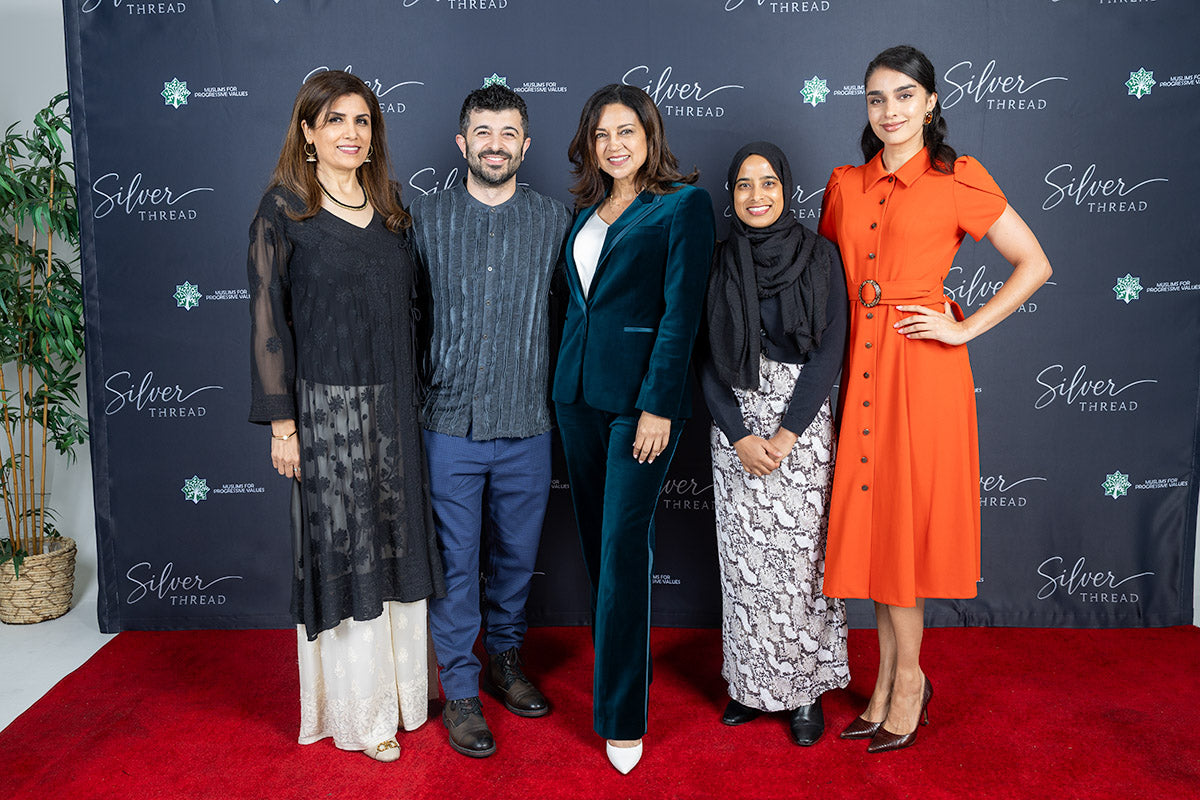 Five guests pose together at the Silver Thread event in front of the Muslims for Progressive Values backdrop